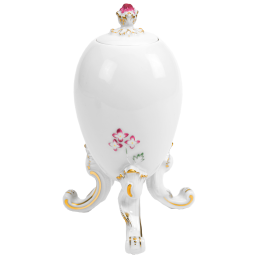 Gefäß eiförmig, 3 Füße, Reliefblumen purpur staffiert, leichte Goldstaffage, H 16,5 cm